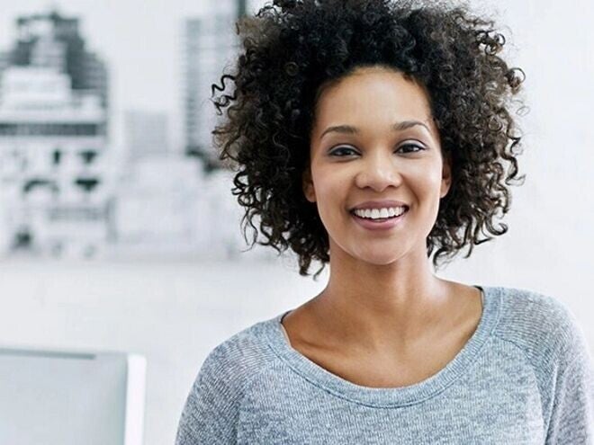 Vitaminas para embarazarse Mujer sonriendo